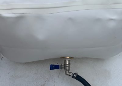 marine fuel bladder on sport boat side discharge